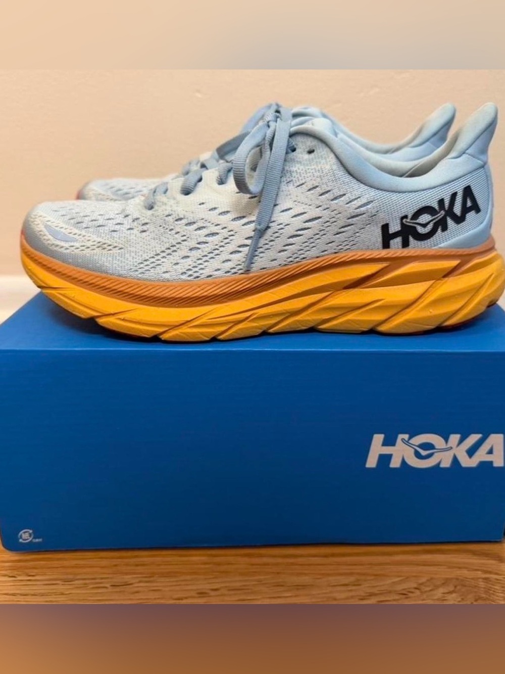 Hoka Women's Pale Blue Trainers with Bright Yellow Midsole